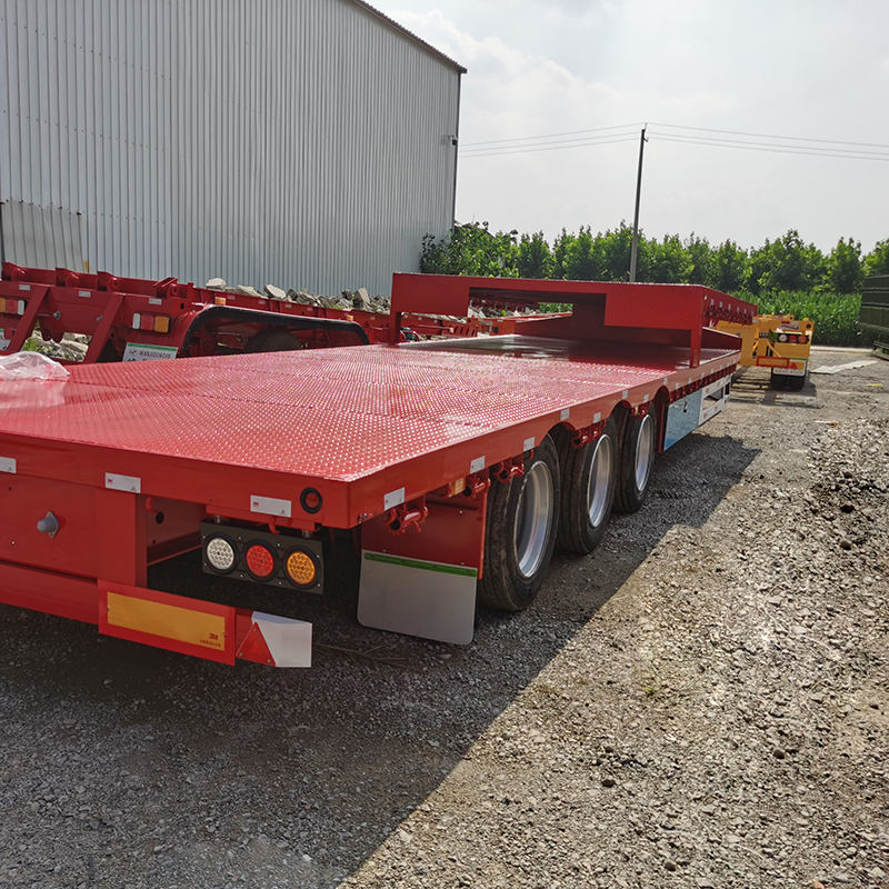 3 axles 40 ft 50 tons new semi trailer Low flatbed semi-trailer strong transportation capacity made in china 